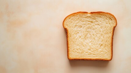 Single slice of plain white bread on light background