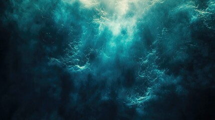 A vivid sea gradient showcasing shades of cyan, teal, and dark blue, with light rays piercing through.