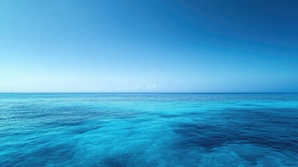 Obraz premium Vibrant blue sea gradient background with smooth transitions of aquamarine, cerulean, and deep ocean blue.