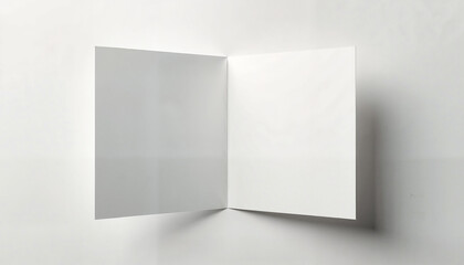 Fototapeta premium Photorealistic open card mockup, white, invitation and greeting card display on white surface with copy space