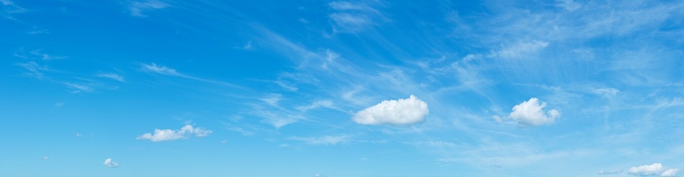 Large panorama of blue sky with white clouds for background use