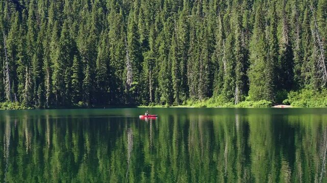 Cooper lake with canoe. Landscape of nature. Canoeing in summer vacation. Nature landscape. Cooper Lake vacation. Boating on the lake. Scenic nature of popular hiking and camping Cooper lake