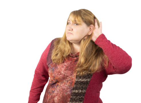 Curious Woman Listening Intently with a Hand to Her Ear