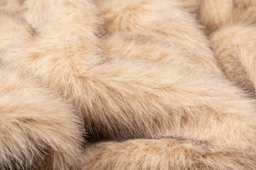Texture of faux fur as a background, top view.