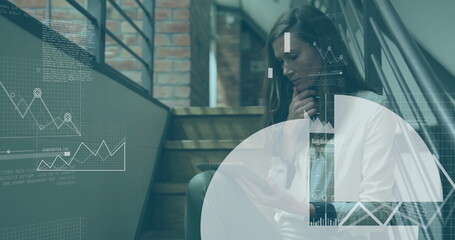 Image of financial data processing over caucasian businesswoman in office