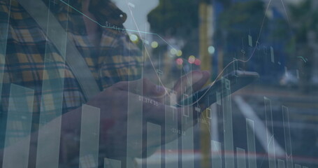 Image of financial data processing over caucasian man using smartphone