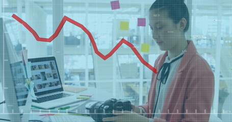 Image of financial data processing over asian businesswoman in office