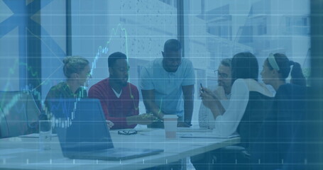 Image of financial data processing over diverse business people in office