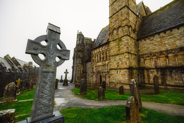 Celtic crosses at Rock of Cashel in Rainy foffy Irish Day , County Tipperary, Ireland