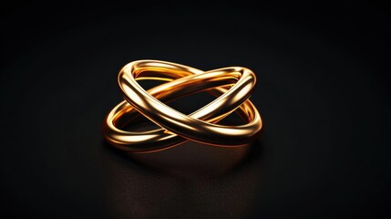 Fototapeta premium Elegant intertwined golden rings on a dark background