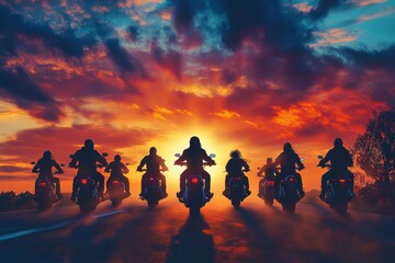 A group of motorcyclists ride down a road at sunset