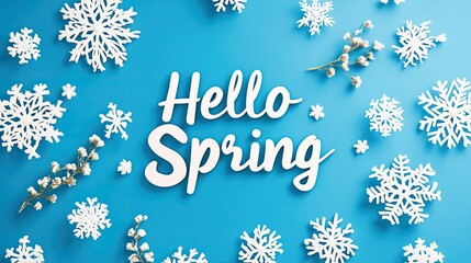 Seasonal greeting with "Hello Spring" typography complemented by spring snowflakes on a vibrant blue flat lay background.