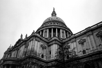 St paul's cathedral dome rising majestically above london in monochrome film