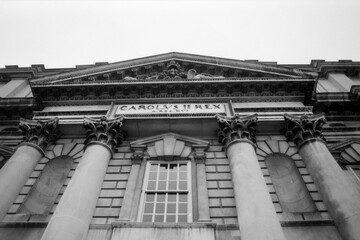 Obraz premium Facade of the old royal naval college chapel showing king charles ii's name in greenwich, london