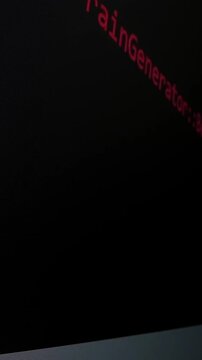 Closeup macro shot movement of coding script moving across LED screen with real-time AI-generated typing, showcasing advanced AI learning in optimization, debug and coding for software development.