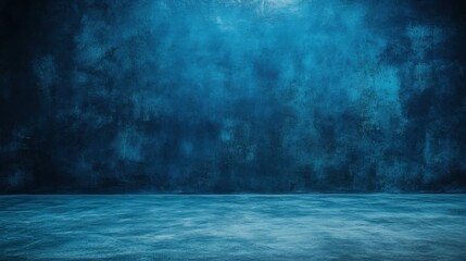 a blue wall with a concrete floor and a blue wall