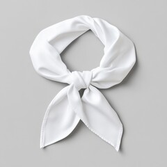 Bandanas mockup concept. A delicate white scarf tied neatly, showcasing its soft fabric and elegant design against a neutral background.