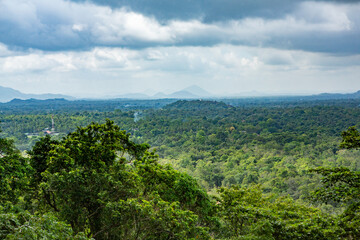 Obraz premium Sigiriya is an ancient rock fortress located in Sri Lanka. Is a UNESCO World Heritage Site and one of Sri Lanka's most iconic landmarks for travelers.