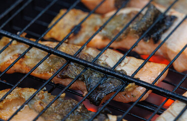 Grilled trout fish sizzling on the barbecue for a perfect outdoor dining experience