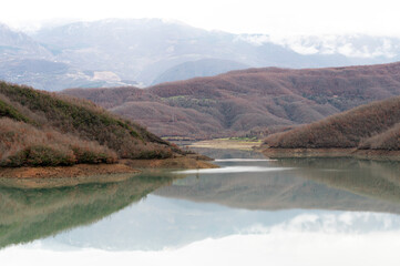 Mountain reflections in the Boivlla lake, Albania