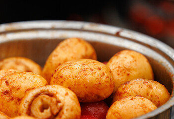Savoring champignon mushrooms coated in rich paprika for a delightful culinary experience