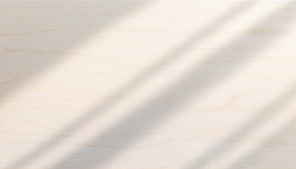 Obraz premium the play of light and shadow on a wooden surface, creating an abstract pattern. The scene evokes a sense of simplicity and minimalism