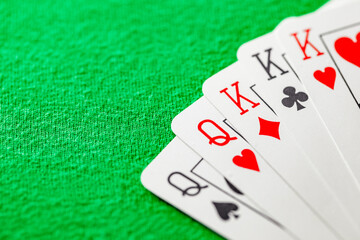 combination of cards, full house, poker one set and one pair of kings and queens