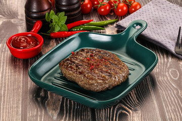 Grilled beef burger cutlet with sauce