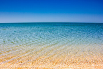 Fototapeta premium sea water surface with waves on the coast