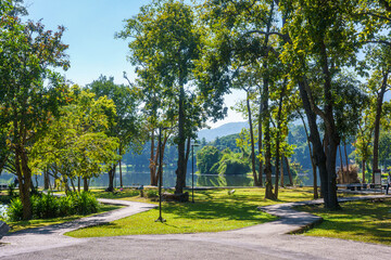 Fototapeta premium a public place leisure travel landscape lake views at Ang Kaew Chiang Mai University and Doi Suthep nature forest Mountain views spring cloudy sky background with white cloud.