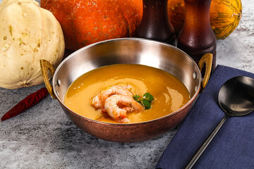 Pumpkin cream soup with prawns