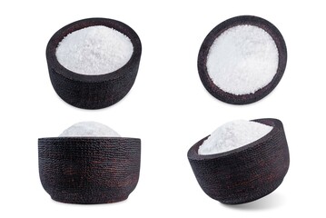 Salt in a wood bowl on a white isolated background