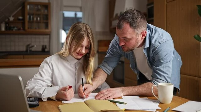  parent helps  child with homework  learning something new, which emphasizes importance of shared education support. Modern methods of education, interactive homework. concept of family education
