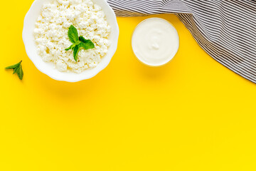 Farm cottage cheese in a bowl, top view. Healthy breakfast