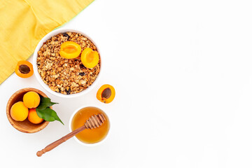 Top view of breakfast with oatmeal granola and ingredients. Healthy morning routine