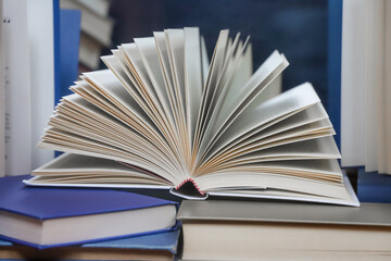 open book on a wooden table