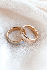 Mixed-metal ring showcases artisan craftsmanship on a soft fabric background