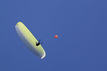 Paraglider being towed by a winch	