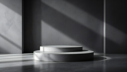 a podium sits center stage, illuminated by dramatic light and shadow 
