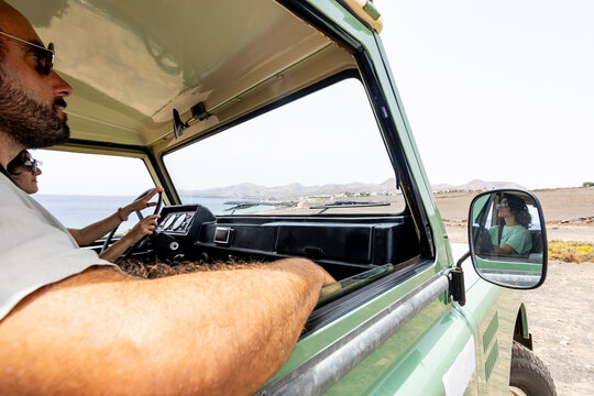 Blind Man and Woman Driving a Motorhome Along the Coast