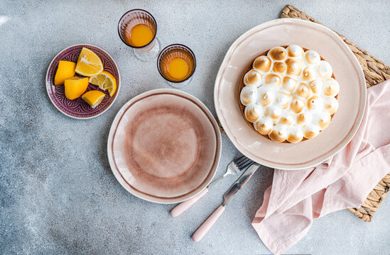 Rustic dessert table with a homemade lemon cake