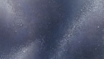 Fototapeta premium A grainy, dark blue background with speckled white accents.