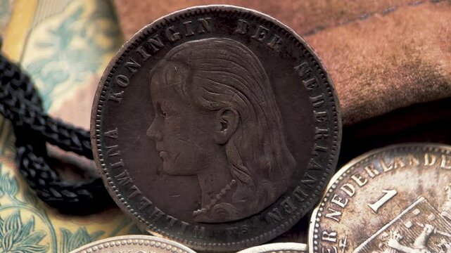 ancient dutch coin one guilder long-haired wilhelmina circulated 1892-1897.