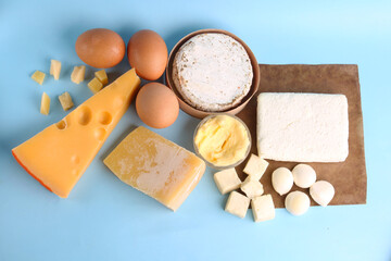 set of dairy products on a blue background