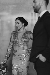 Young couple together on their wedding anniversary at the theatre photoshoot