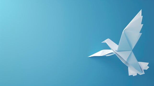 An origami bird, crafted from a single piece of paper, stands elegantly against a solid blue background.