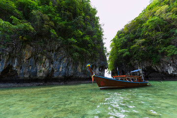 Hong Island Beach, and the traditional longtail boat