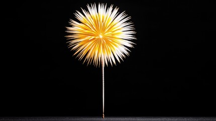 Abstract golden firework burst against black background, celebration concept, design element