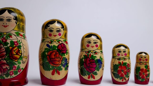 Russian Nesting Dolls on a White Background Panning Right