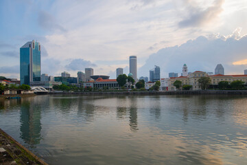 Fototapeta premium Modern skyscrapers from Singapore River including High Street Centre, Parliament House, Supreme Court and Raffles City in downtown core of Central Area, Singapore. 